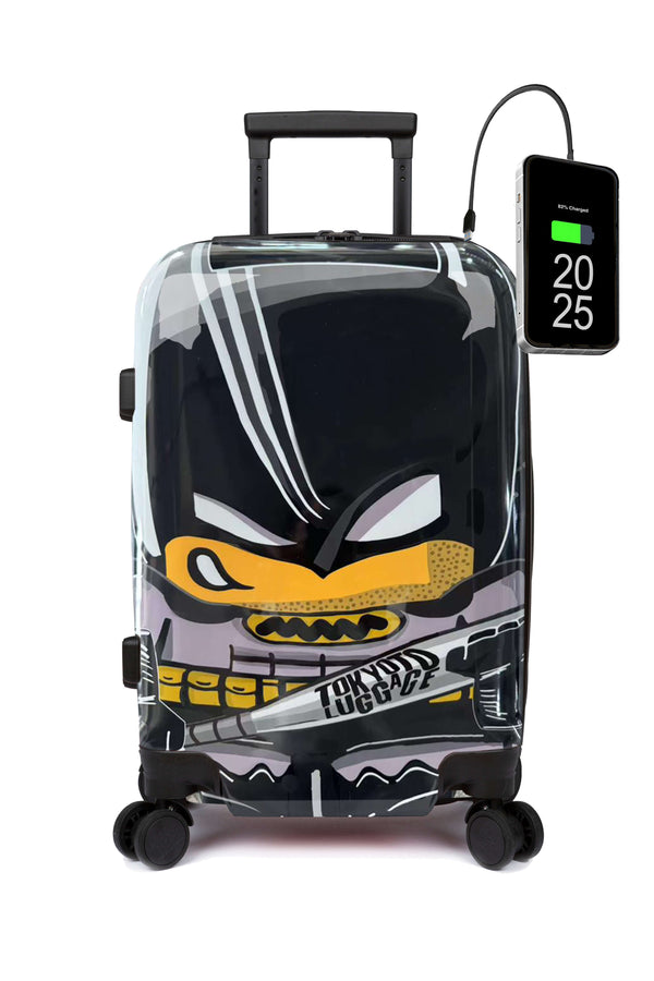 Children's Batman-themed suitcase with digital display on a white background